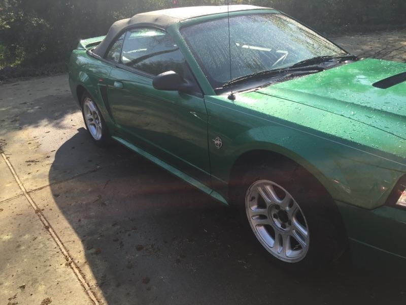 Salvage title 1999 Ford Mustang Convertible